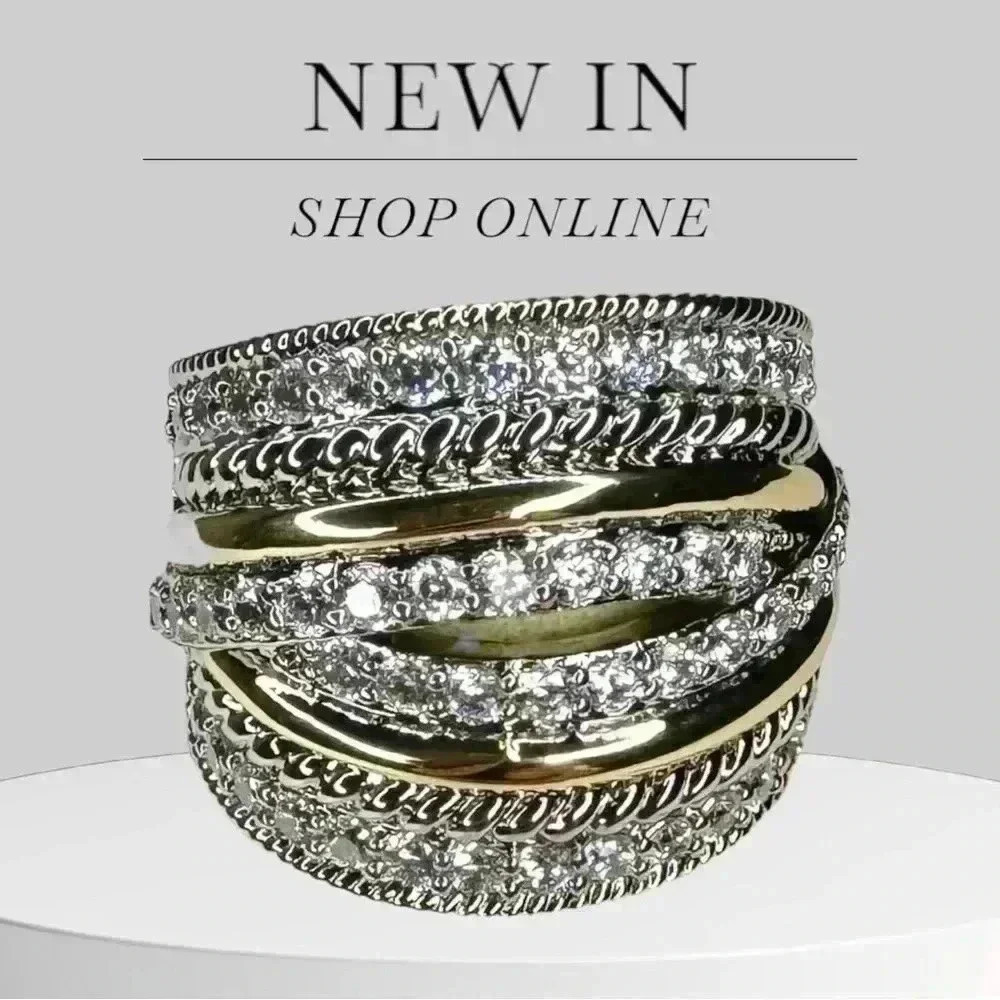 Two Tone Cross Over Ring Simulated Stones
